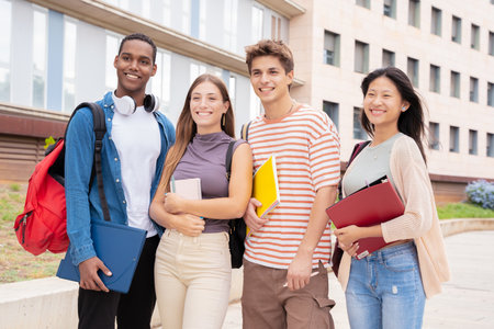 Portrait closeup multiracial group of students smiling looking at camera outdoor