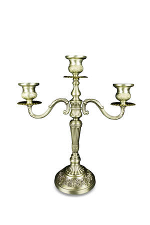 Triple bronze candelabrum with three candlesticks. Isolated on white background.の写真素材