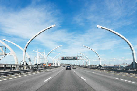 Highway Western Expressway Diameter on a sunny day Saint - Petersburg, Russia, June 2021のeditorial素材