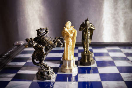 White queen, black horse and king chess from Harry Potter movie on the chessboard - Saint Petersburg, Russia, June 2021のeditorial素材