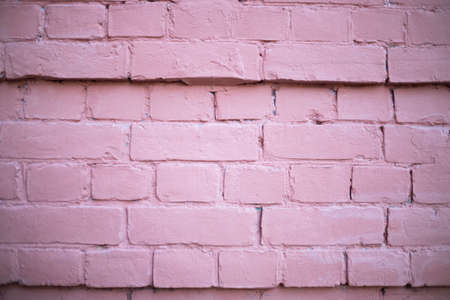 Background of pink brick wall with bordersの写真素材
