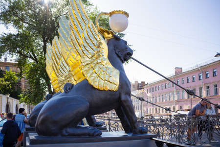 Statues of golden-winged lions at the Bank bridge - Saint Petersburg, August 2020のeditorial素材