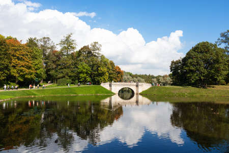 Lake bridge in Palace Park, sunny summer day - Russia, Gatchina, September 2021のeditorial素材