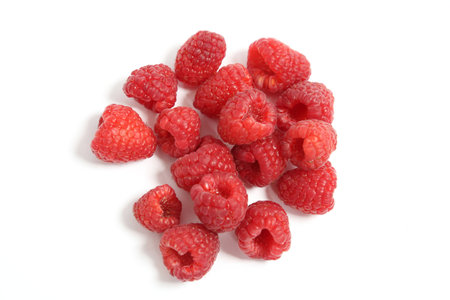Fresh Harvest Organic Raspberries Isolated on White Background Top View Natural Light Selective Focusの写真素材