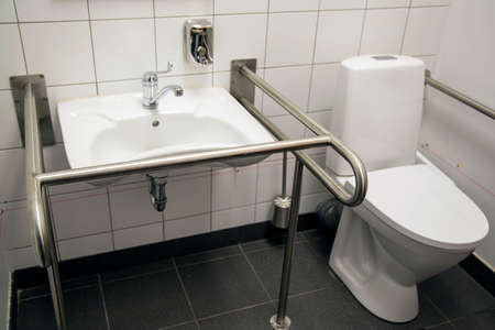 Handicapped Access Bathroom with Grab Bars and a Toiletの写真素材