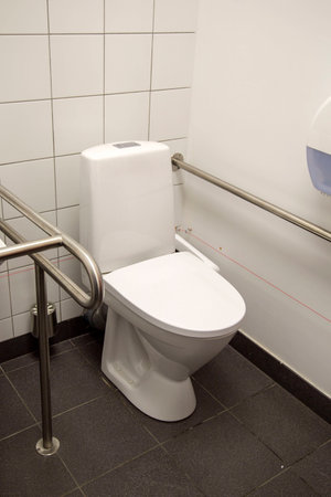 Handicapped Access Bathroom with Grab Bars and a Toiletの写真素材