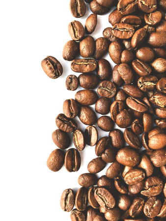 Coffee Beans on White Background Natural Light Selective Focus Top View Tonedの写真素材