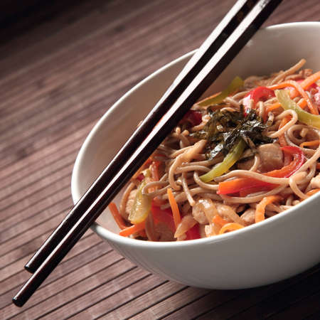 Buckwheat noodles with chicken and vegetables in Japanese styleの写真素材