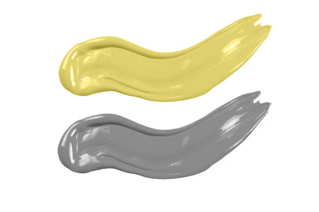 Yellow and grey paint isolated on white background.の写真素材
