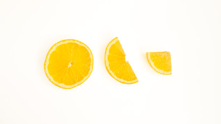 Three lemon slices, half, quarter and circle isolated on white background, fresh and juicy lemon,...