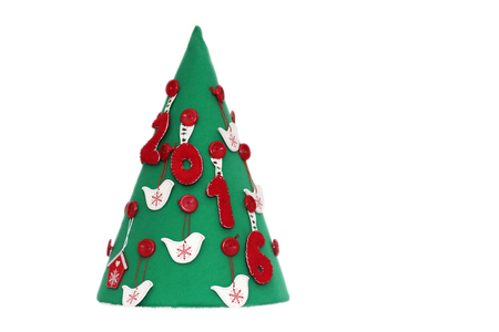 Handmade New Year tree with 2016 sign over white background, winter holidays symbolの写真素材