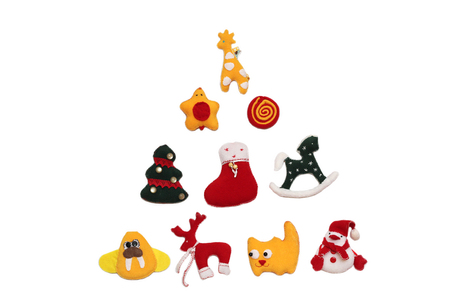 New Year Tree formed with handmade Christmas toys over white background, winter holidays symbolの写真素材