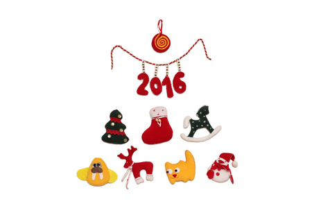 New Year Tree with 2016 sign formed with handmade Christmas toys over white background, winter holidays symbolの写真素材