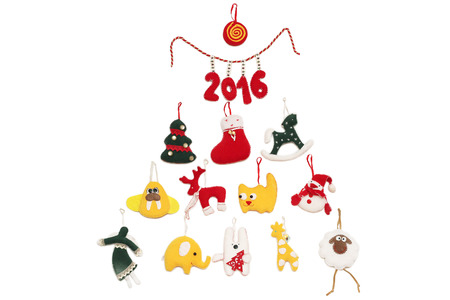 New Year Tree with 2016 sign formed with handmade Christmas toys over white background, winter holidays symbolの写真素材