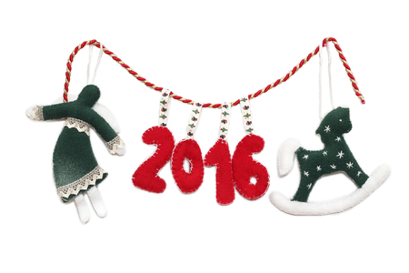 New Year 2016 sign formed with handmade Christmas toys over white background, winter holidays symbolの写真素材