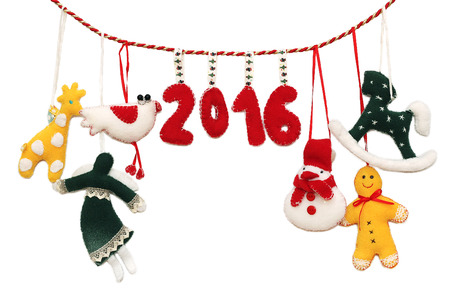 New Year 2016 sign formed with handmade Christmas toys over white background, winter holidays symbolの写真素材