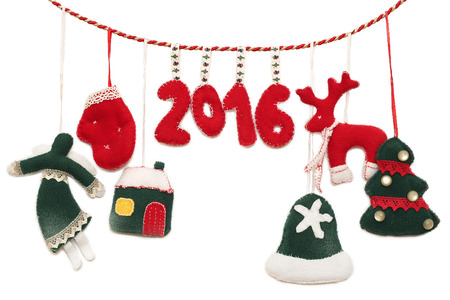 New Year 2016 sign formed with handmade Christmas toys over white background, winter holidays symbolの写真素材