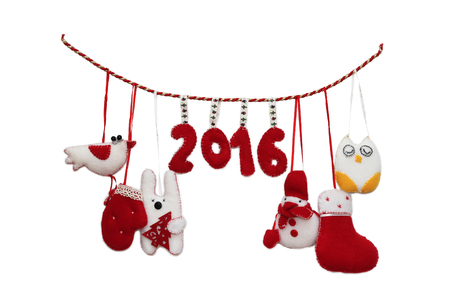 New Year 2016 sign formed with handmade Christmas toys over white background, winter holidays symbolの写真素材
