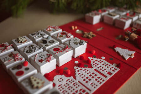 Original advent calendar made of jewelry boxes and a binder like open book, New Year craft, diy. Magic moment premonition, seasonal activity, Christmas miracle. Soft focus, depth of fieldの写真素材
