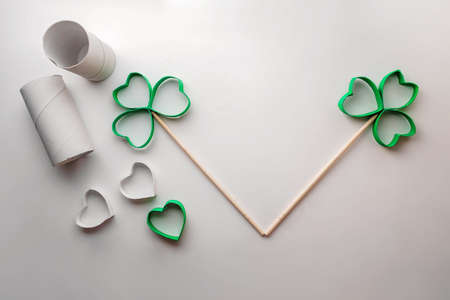 DIY paper clover with toilet roll tube for Saint Patrick Day celebration, zero waste decor for party...