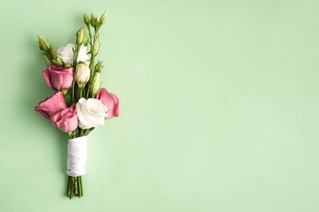 Bouquet of Flowers eustoma pink and white on green background isolated
