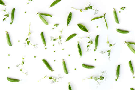 Flat lay natural light green snap peas isolated on whiteの写真素材