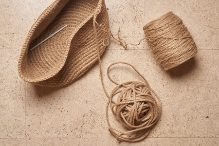 Jute crochet knitting bag or basket natural rope. Flat lay hobby concept. High quality photo
