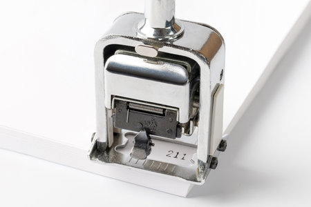 To number the pages, automatic numbering system for paper. office supplies, stationery. To stamp for numbering of documentsの写真素材
