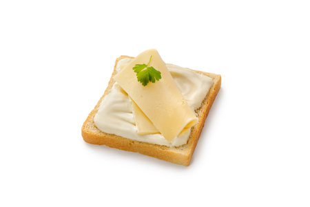 Toast with sliced cheese and parsley on bread. Bruschetta, snack, appetizer, sandwich isolated on white background with clipping path, cut out. top view.の写真素材