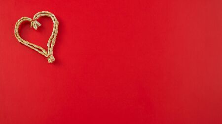 Red background with a heart. Romantic background for valentin's dayの写真素材