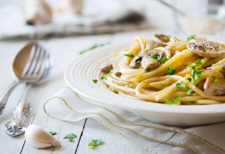 Spaghetti pasta with mushrooms and creamy sauseの写真素材