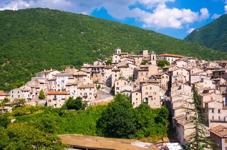 Picturesque small town or village in Italy surrounded by green. Panoramic view of old housesの写真素材