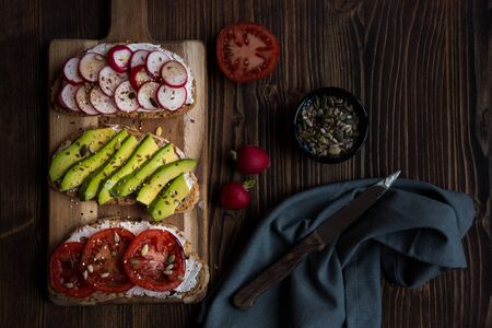 Vegetable sandwiches with radish, avocado and tomato, healthy vegetarian snackの写真素材