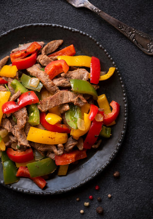 Cooked bell peppers with meat, healthy vegetable dishの写真素材