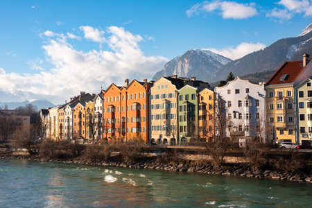 City of Innsbruck, Austria. Panoramic view of colorful houses along riverの写真素材