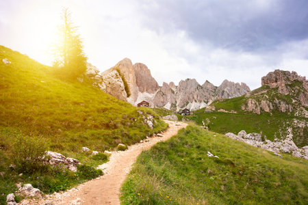 Mountain hiking trail with people walking in Dolomite alpsの写真素材
