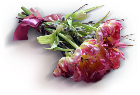 A spring bouquet of delicate pink tulips with pussy willow and ribbonsの写真素材