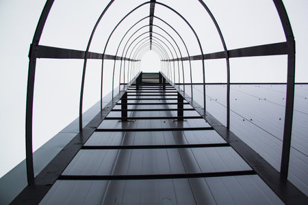 Staircase to the top of the building in the sky.の写真素材