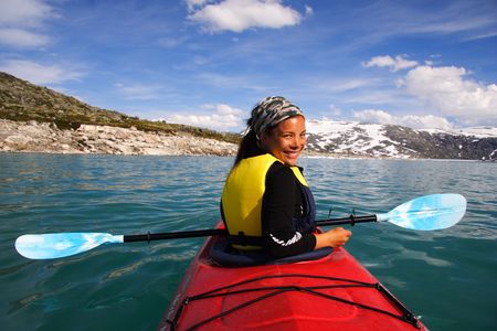 Kayak at glacier lake, Styggevatnet, Jostedalsbreen in Norway.の写真素材