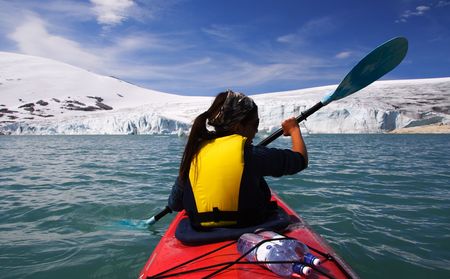 Kayak at glacier lake, Styggevatnet, Jostedalsbreen in Norway.の写真素材