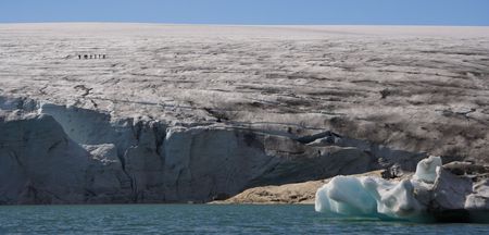 Glacier walking on Jostedalsbreen in Norway. People and scale visable in big format. The lake is...