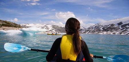 Kayak at glacier lake, Styggevatnet, Jostedalsbreen in Norway. Summer.の写真素材