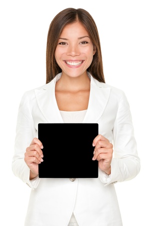 Smiling beautiful young Asian woman holding a small square black card with copyspace for your text or advertising isolated on whiteの写真素材