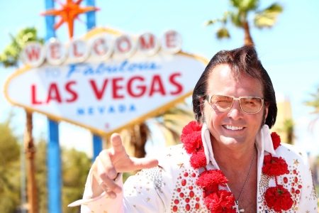 impersonator man in front of Las Vegas on the strip pointing looking at cameraのeditorial素材