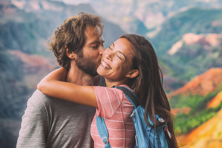 Couple in love kissing on nature travel hiking in mountains.の写真素材
