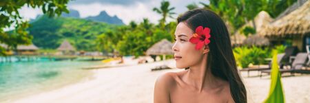 Asian natural beauty woman wellness spa skincare banner panorama on tropical beach background.の写真素材
