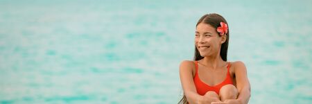 Beautiful young Asian woman natural beauty wellness spa on blue ocean water background panoramic....