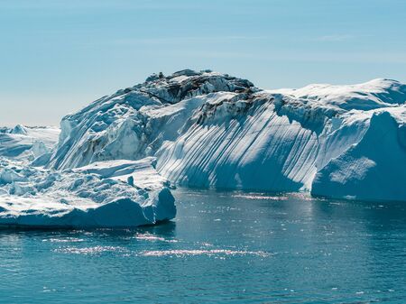 Global Warming and Climate Change - Giant Iceberg from melting glacier in Ilulissat, Greenland....