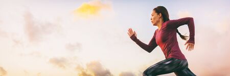 Run fast woman athlete sprinting profile on sky banner panorama background. Runner running starting...