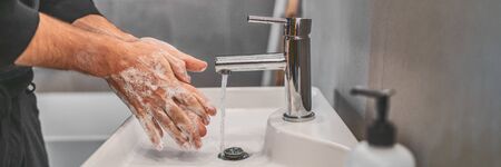 Corona virus travel prevention wash hands with soap and hot water. Hand hygiene for coronavirus outbreak. Protection by washing hands frequently concept panoramic banner header.の写真素材
